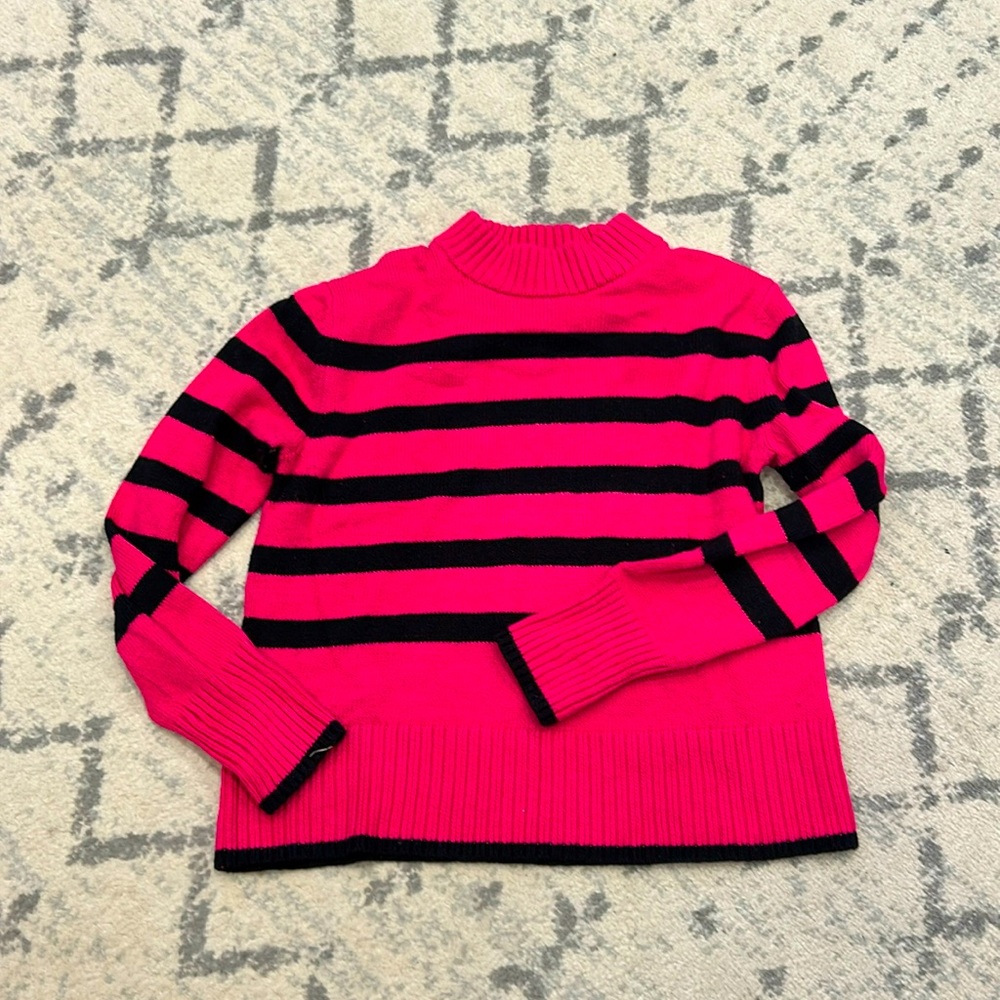 Cozy pink and black sweater by Elie Tahari.